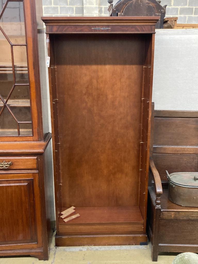A reproduction mahogany open fronted bookcase, length 82cm, depth 28cm, height 183cm